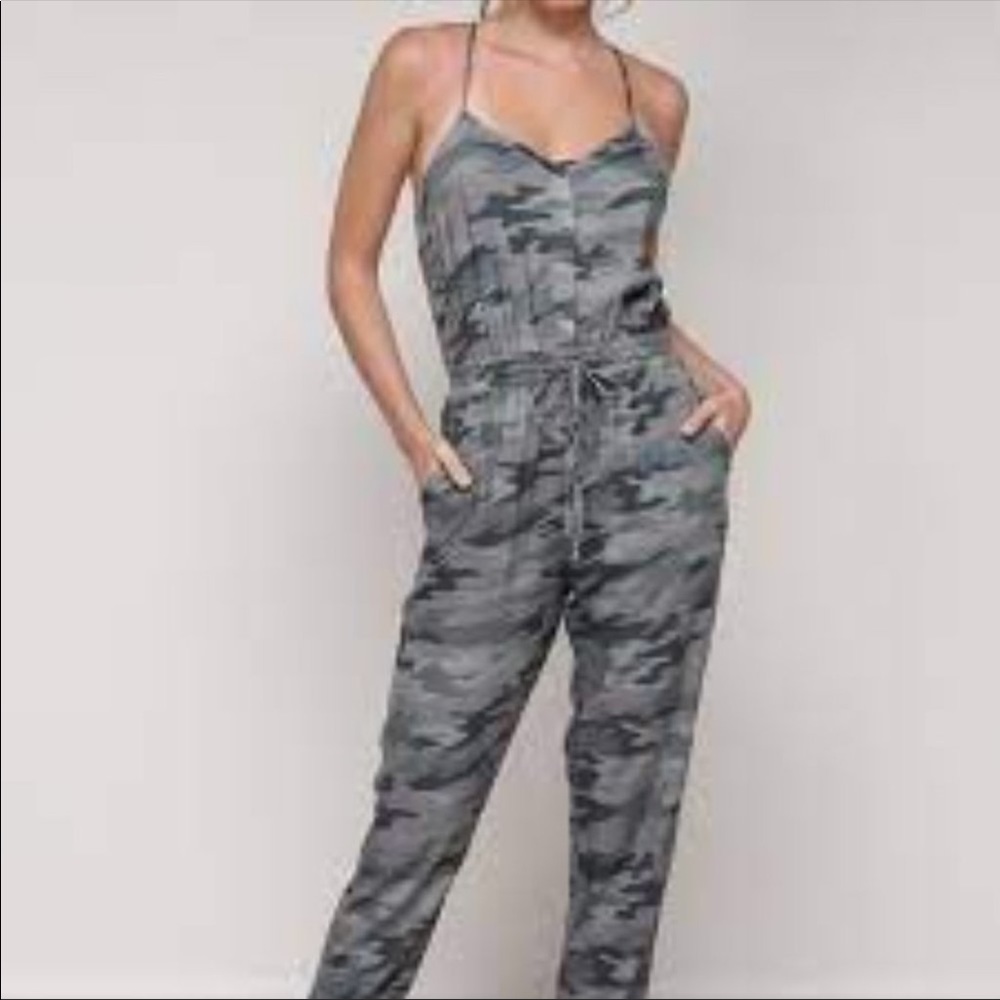 Mustard Seed Camo Jumpsuit. Has pockets! Small. New with tags.